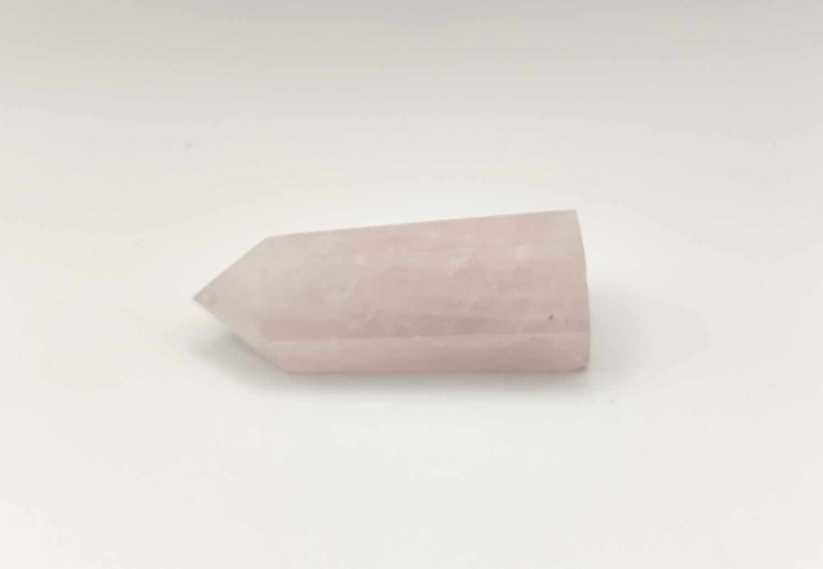 Pointe de quartz rose naturel