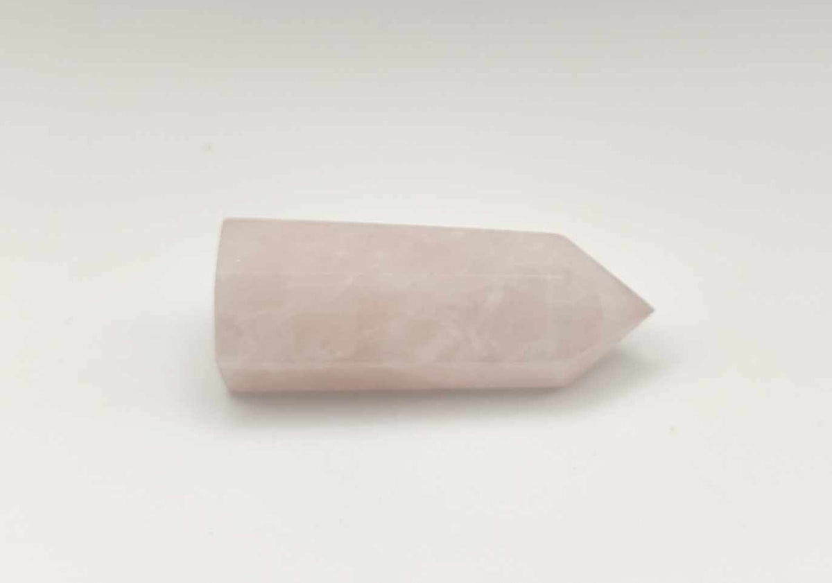 Pointe de quartz rose naturel