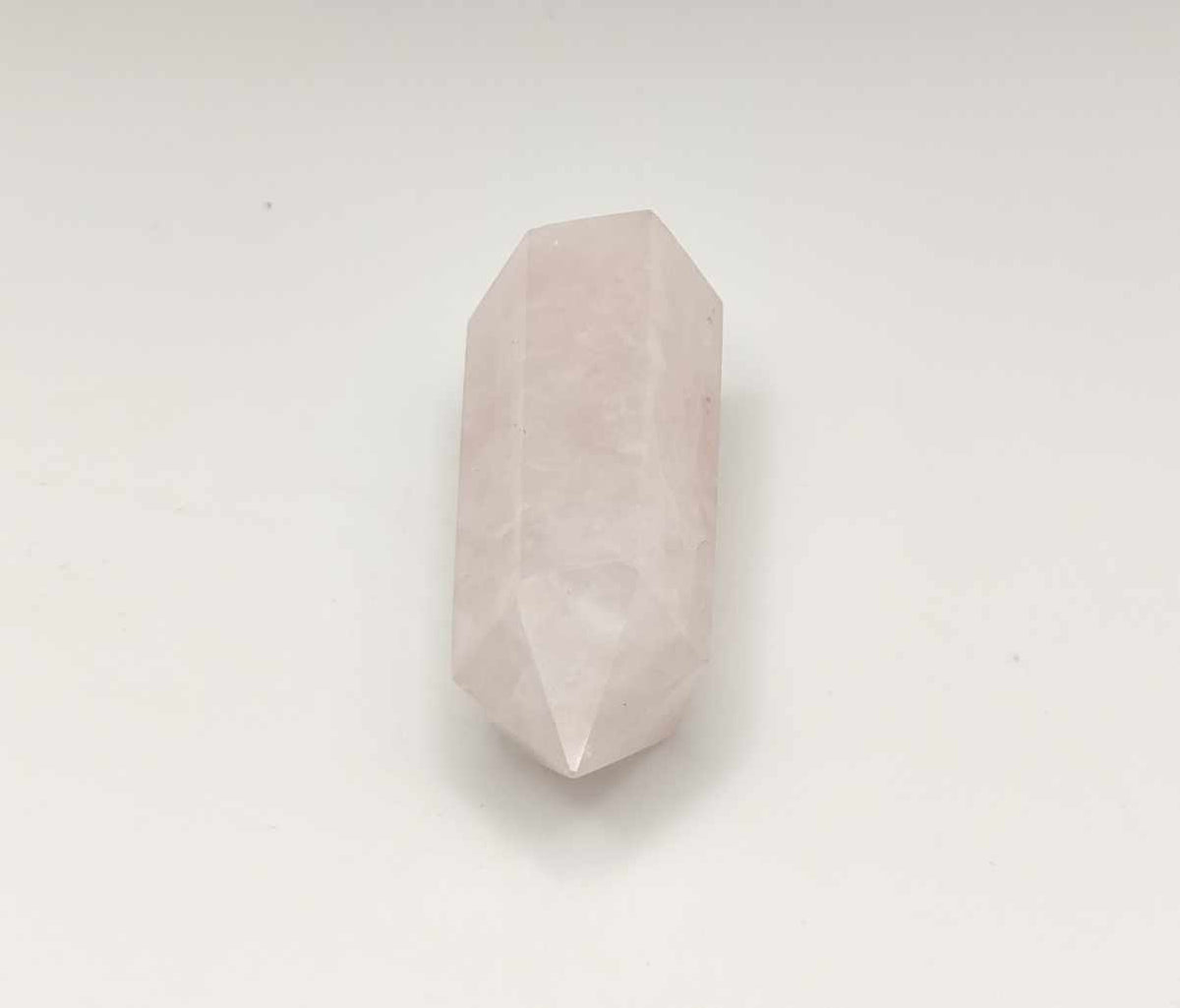 Pointe de quartz rose naturel